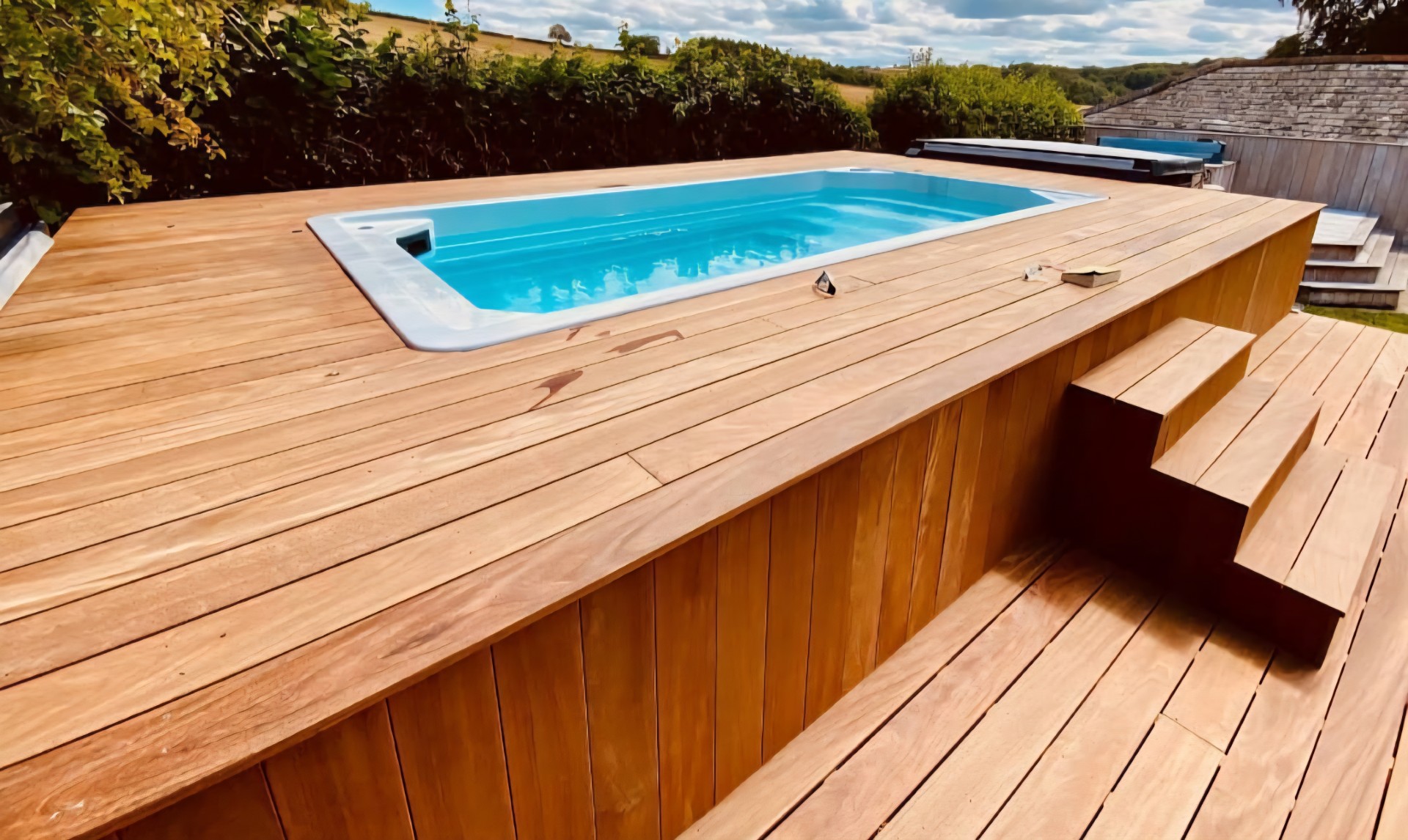 Premium Ipe hardwood cladding around exercise pool